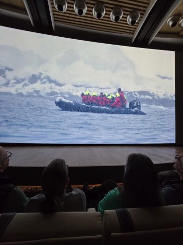 2025-01-23-12.44.43Pictures shown at the captain reception as we left Antarctica