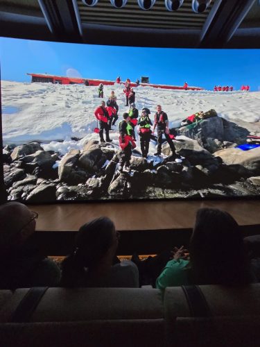 2025-01-23-12.46.35Pictures shown at the captain reception as we left Antarctica